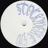 a white disc with blue writing on it